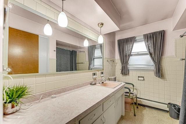 16734 Evans Ave, South Holland, IL 60473 - full bathroom featuring a baseboard radiator, tile walls, vanity, healthy amount of natural light, and curtained shower