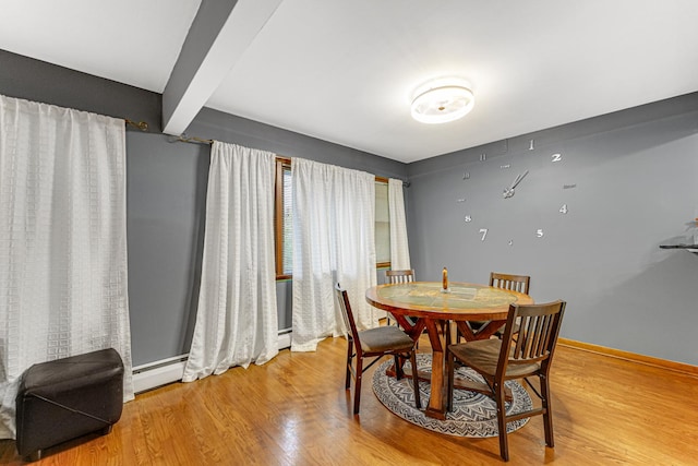 16734 Evans Ave, South Holland, IL 60473 - dining room with baseboard heating, wood finished floors, and beam ceiling
