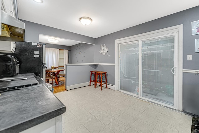 16734 Evans Ave, South Holland, IL 60473 - kitchen featuring ventilation hood and baseboards