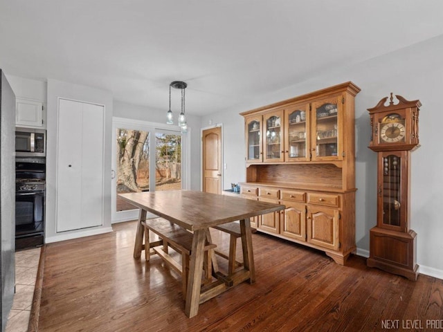 interior space featuring hardwood / wood-style floors and ceiling fan