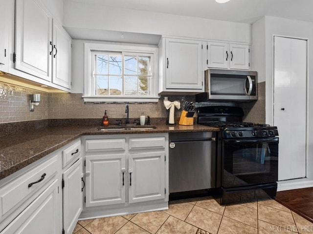 kitchen featuring white cabinetry, ceiling fan, hanging light fixtures, dark hardwood / wood-style flooring, and black fridge with ice dispenser