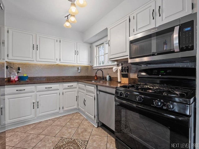 miscellaneous room with dark hardwood / wood-style floors and ceiling fan with notable chandelier