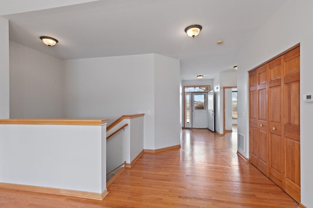 hallway featuring light hardwood / wood-style flooring