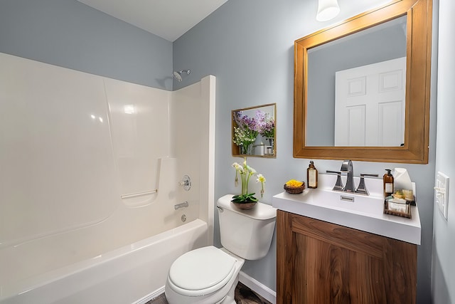 full bathroom featuring vanity,  shower combination, and toilet