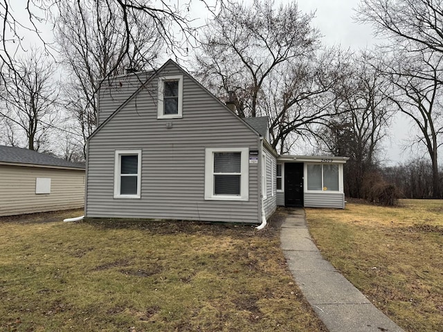 view of front of home with a front yard