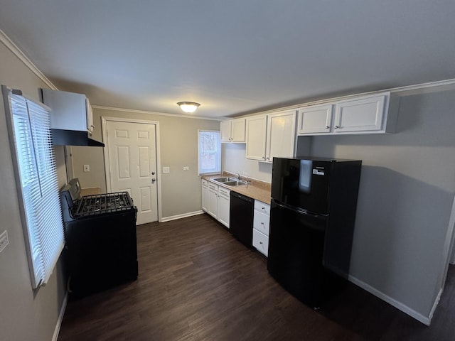 kitchen featuring white cabinets, sink, dark wood-type flooring, and black appliances