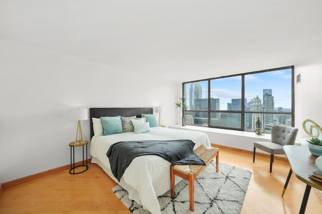 bedroom featuring light wood-type flooring