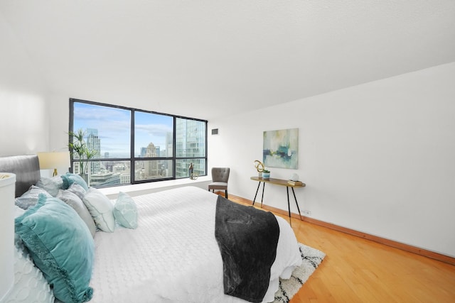 bedroom with wood-type flooring