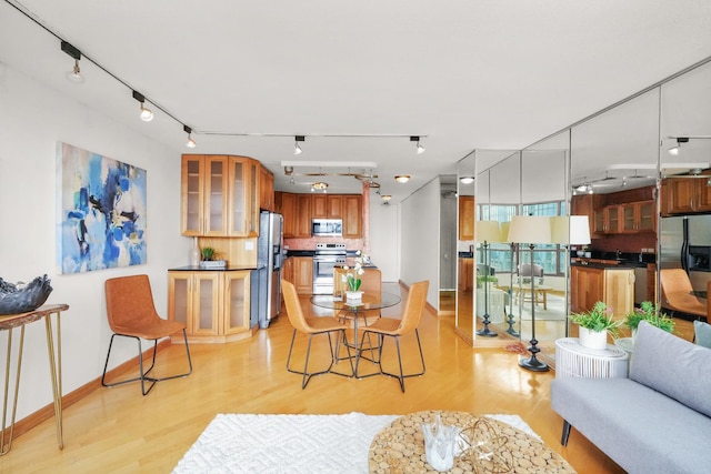 dining room featuring light hardwood / wood-style flooring