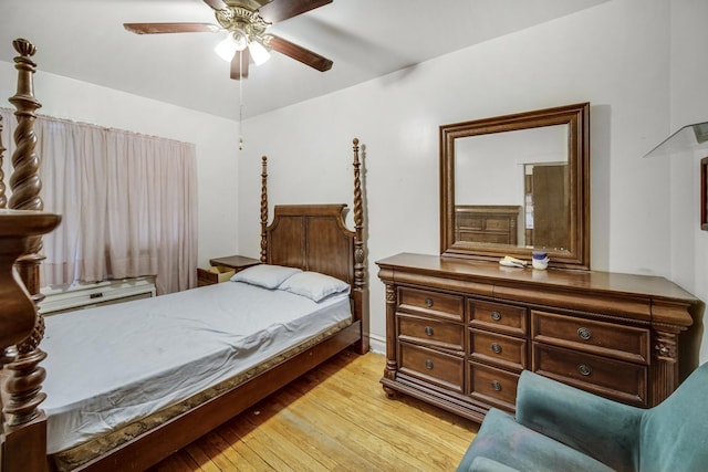 bedroom with light wood-type flooring and ceiling fan