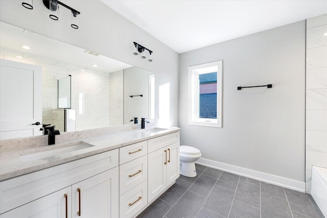 bathroom with a shower, tile patterned flooring, vanity, and toilet