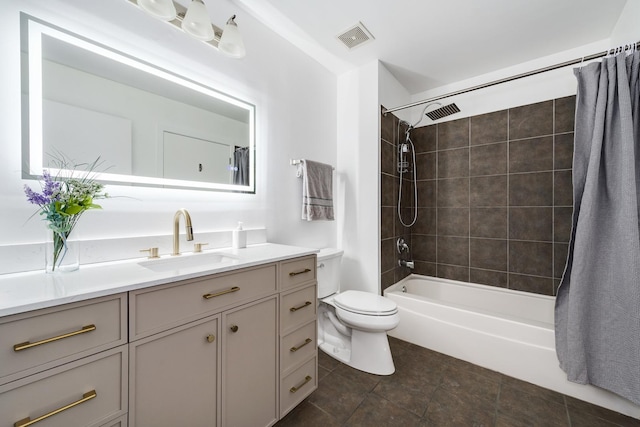 full bathroom featuring shower / bath combo, vanity, and toilet