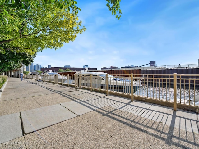 view of patio / terrace with a water view