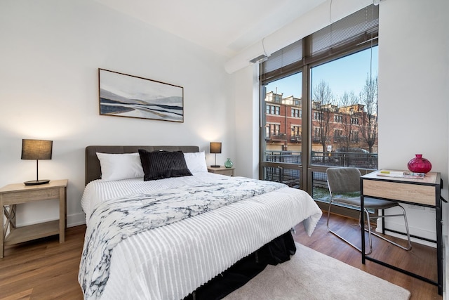 bedroom featuring wood-type flooring