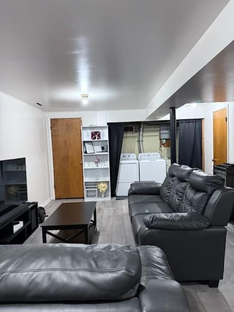 living room featuring washer / dryer