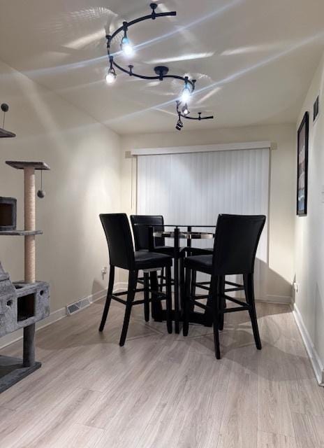 dining area featuring light hardwood / wood-style floors