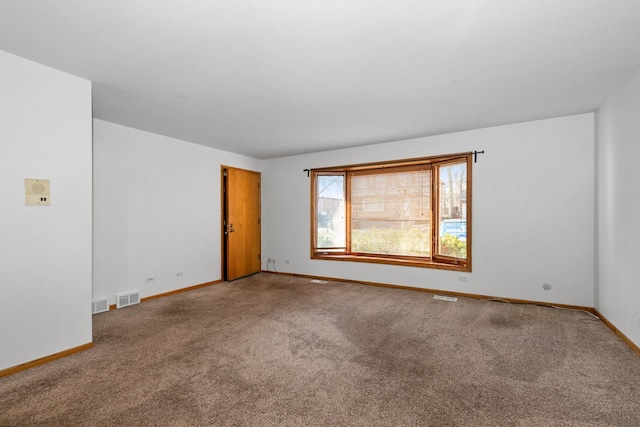 view of carpeted spare room