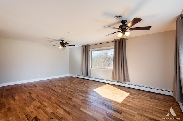 unfurnished room featuring a baseboard heating unit, dark hardwood / wood-style floors, and ceiling fan