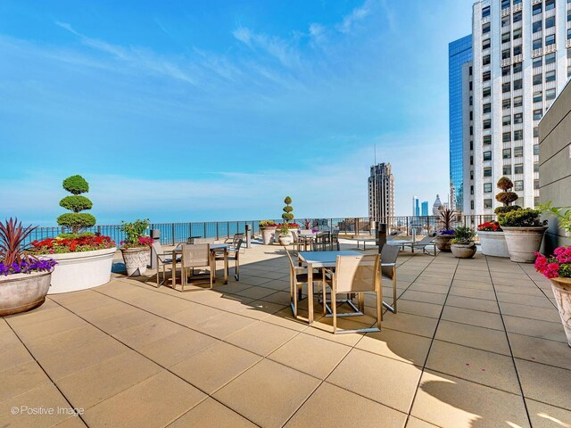 view of patio featuring a water view