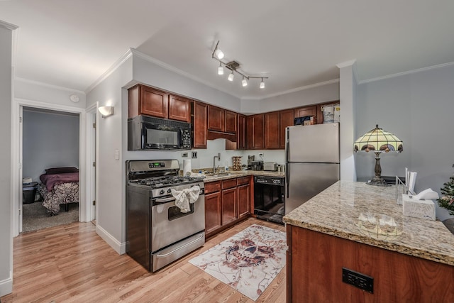 kitchen featuring black appliances, sink, ornamental molding, light hardwood / wood-style floors, and light stone counters