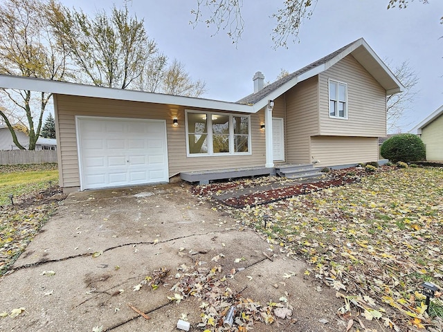 split level home with a garage