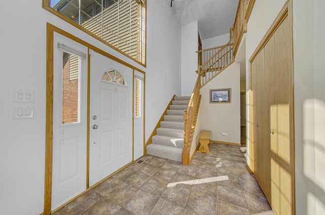 entrance foyer with a high ceiling