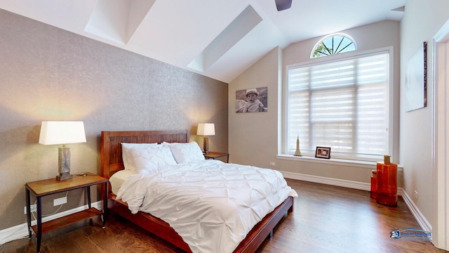 bedroom with dark hardwood / wood-style floors, vaulted ceiling, multiple windows, and ceiling fan