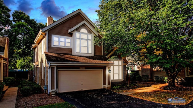 view of front of home with a garage