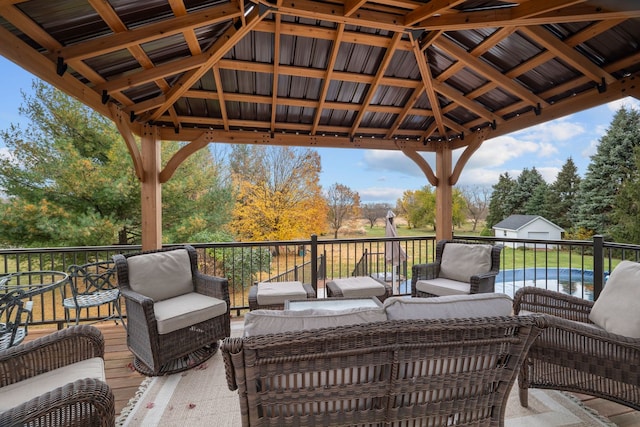 deck with an outdoor living space and a gazebo