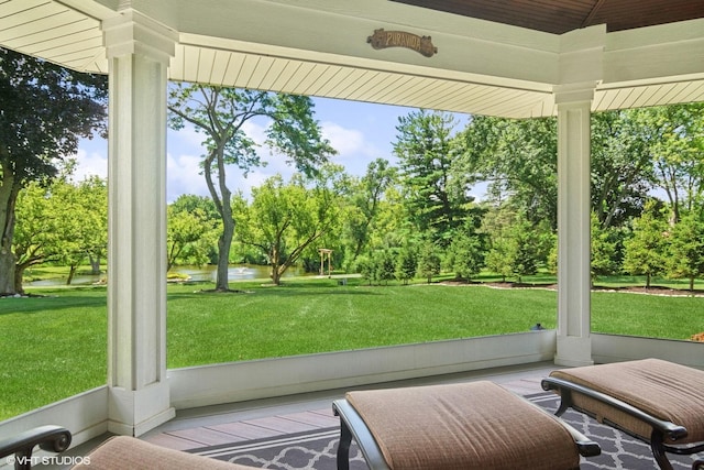 unfurnished sunroom featuring plenty of natural light