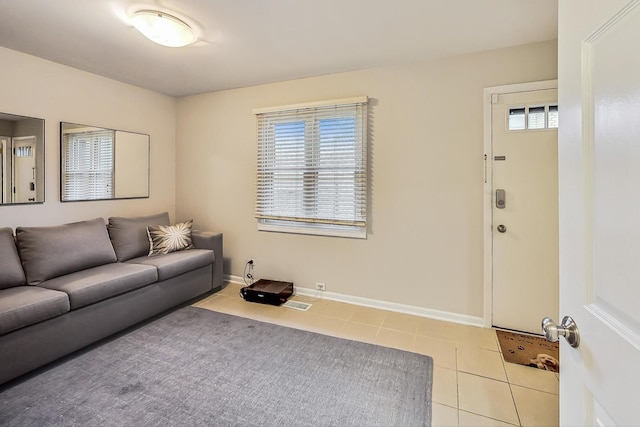 living room featuring light tile patterned floors