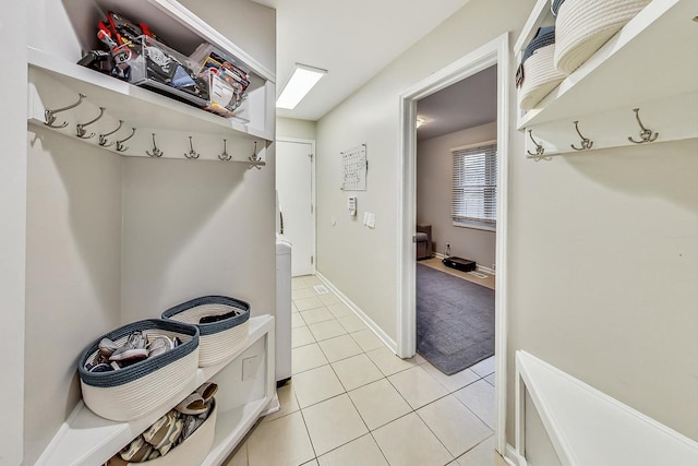 mudroom featuring light tile patterned floors