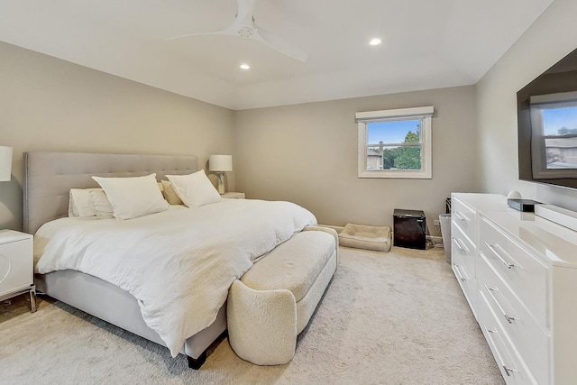 carpeted bedroom with ceiling fan