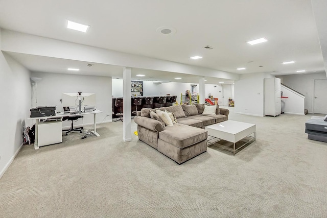 living room featuring light carpet