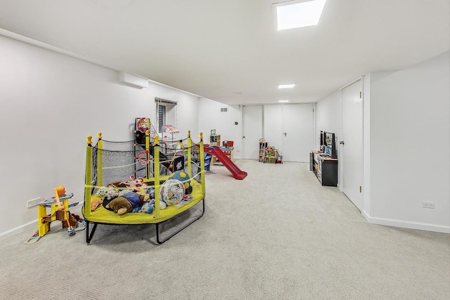 game room with light carpet