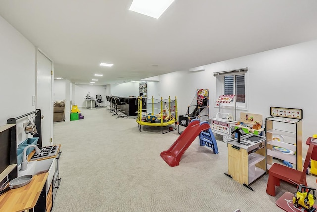 playroom with light carpet