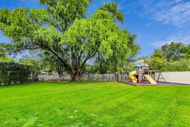 view of yard with a playground