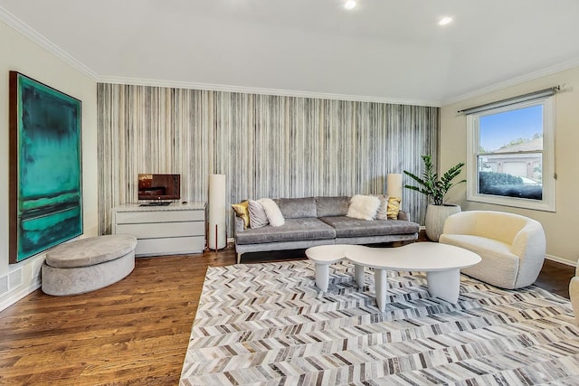 living room with light hardwood / wood-style floors and ornamental molding