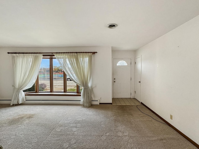 entrance foyer featuring carpet