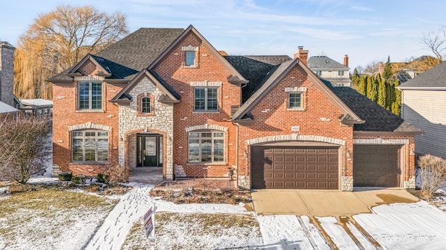 view of front of property with a garage