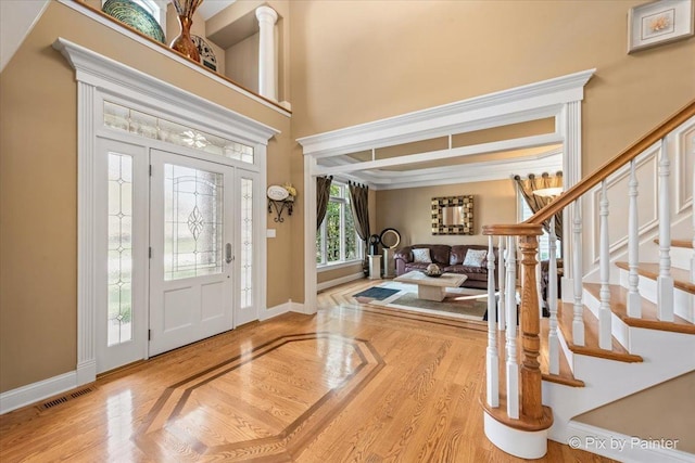 entrance foyer with hardwood / wood-style flooring