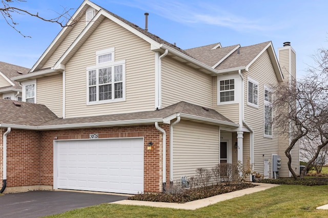 front facade with a garage