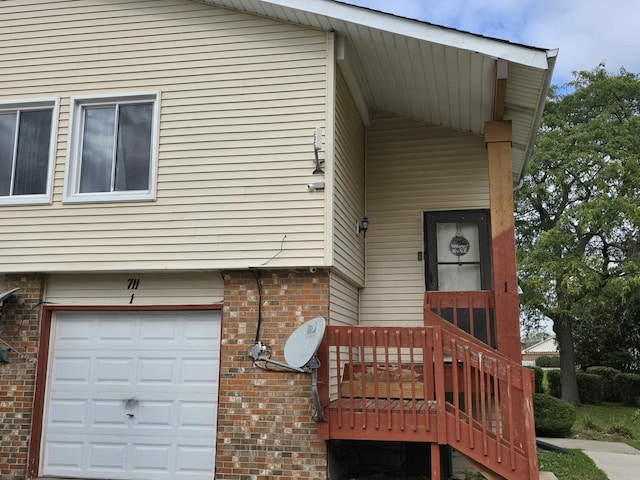 property entrance with a garage