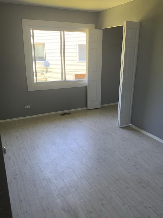 empty room featuring light wood-type flooring