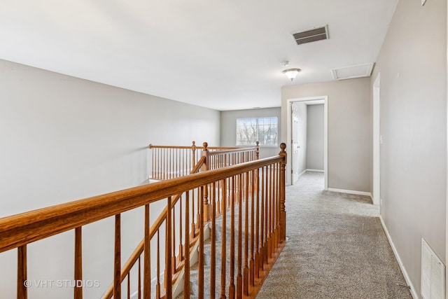 hallway with light carpet