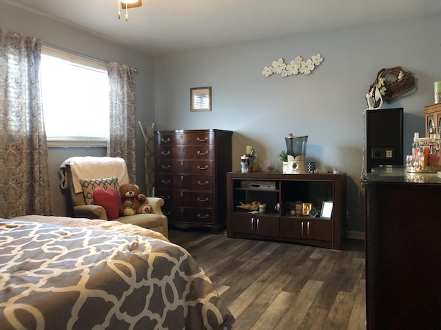 bedroom featuring dark hardwood / wood-style floors