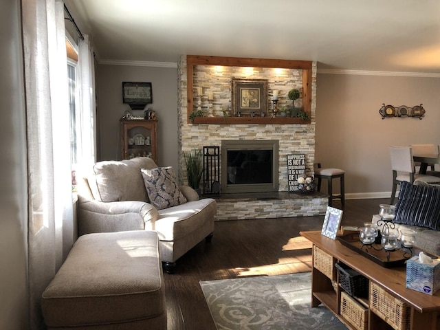 living room with a stone fireplace, dark hardwood / wood-style floors, and ornamental molding