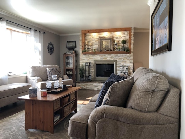 living room featuring a stone fireplace and crown molding