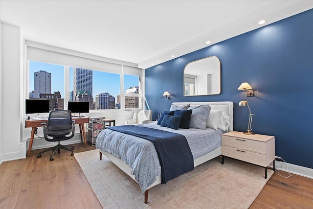 bedroom featuring hardwood / wood-style floors