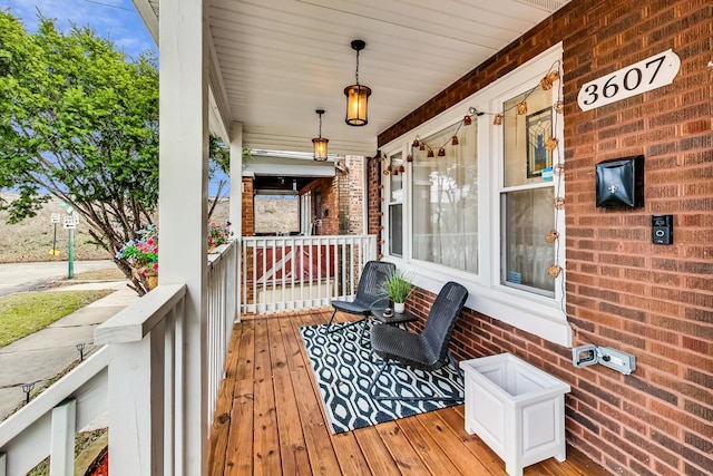 wooden deck with covered porch